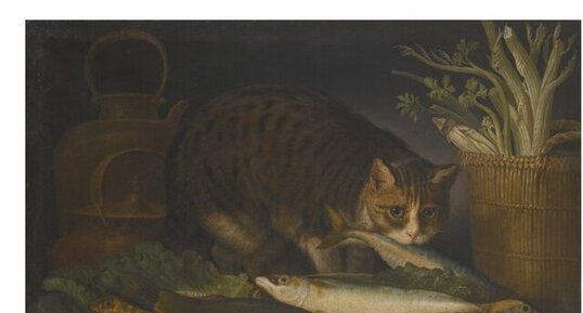 Still life with a cat and a mackerel on a table top